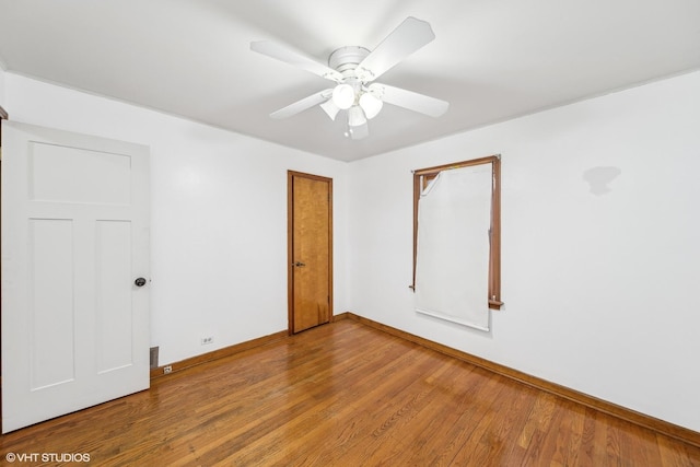 unfurnished room featuring wood-type flooring and ceiling fan