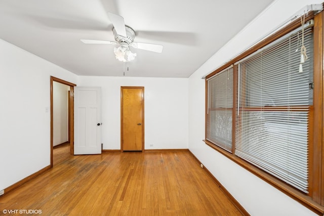 unfurnished room featuring ceiling fan and light hardwood / wood-style floors