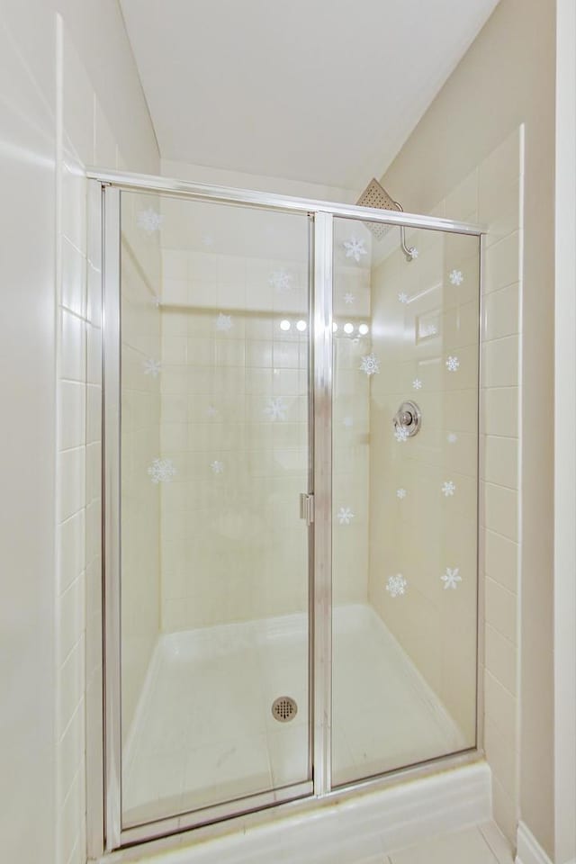 bathroom featuring walk in shower