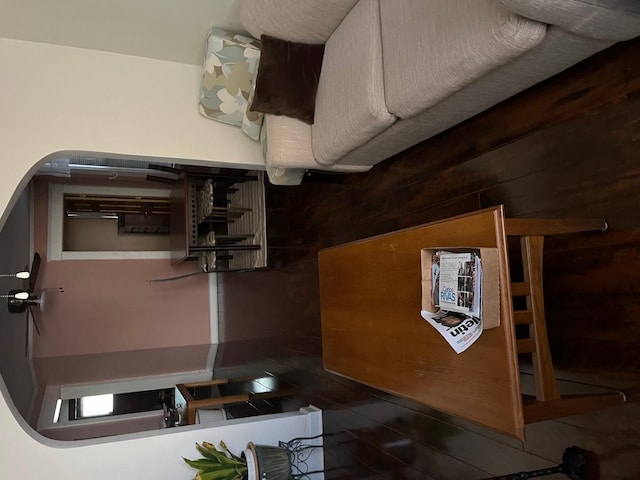 bedroom featuring wooden walls