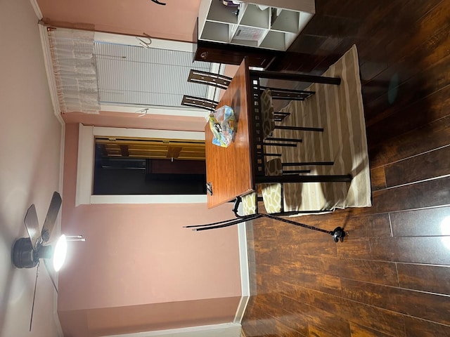 unfurnished dining area with wood walls