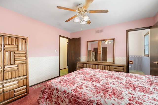 bedroom featuring ceiling fan and carpet flooring