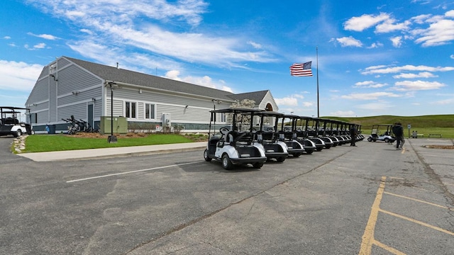 view of parking with a carport