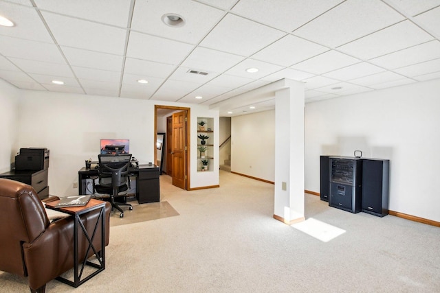 office with light colored carpet and a drop ceiling