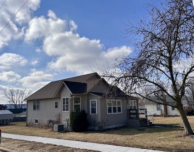 view of home's exterior featuring central AC