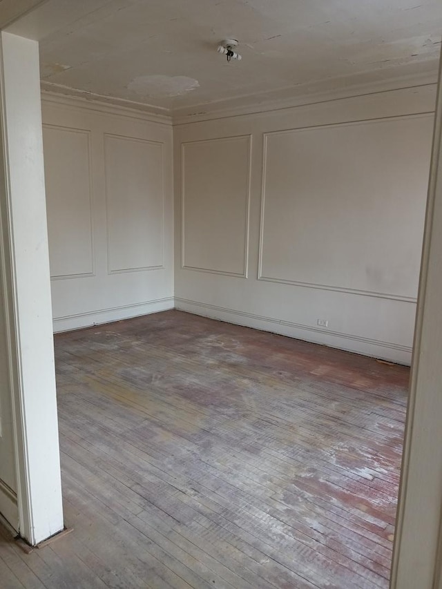 spare room featuring light hardwood / wood-style floors