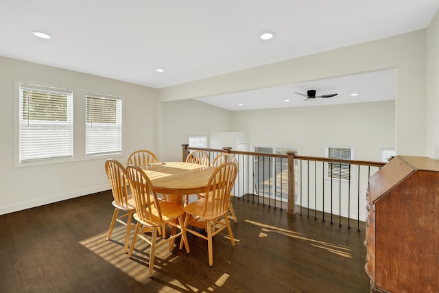 dining room featuring ceiling fan and dark hardwood / wood-style flooring