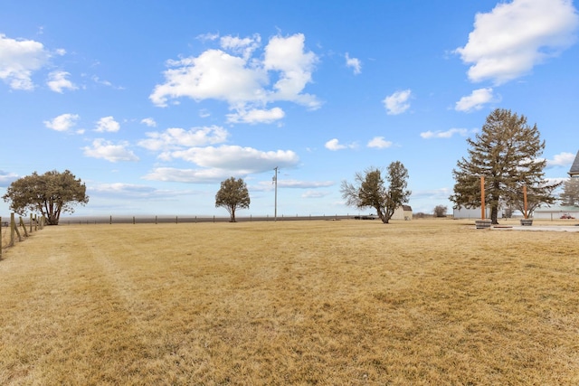 view of yard with a rural view