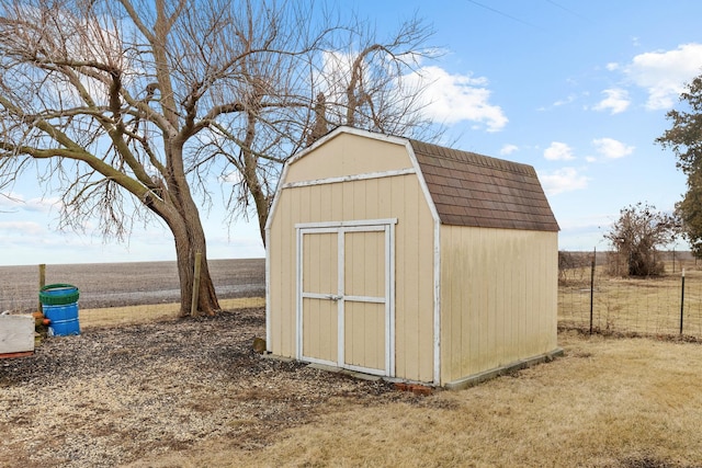 view of outdoor structure featuring a rural view