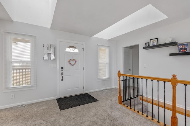 foyer with light carpet