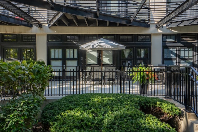 view of gate featuring french doors