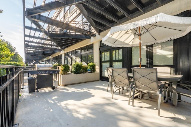 view of patio / terrace with outdoor dining space and grilling area