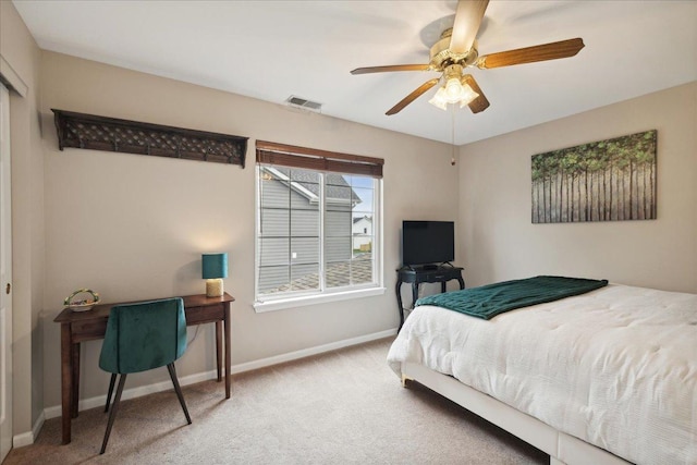 carpeted bedroom featuring ceiling fan