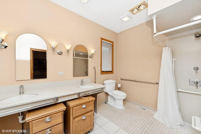 bathroom with vanity, tile patterned flooring, toilet, and a shower with shower curtain