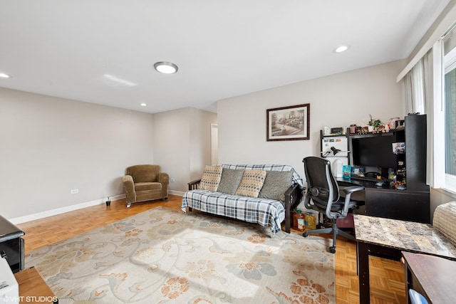 living room featuring parquet flooring