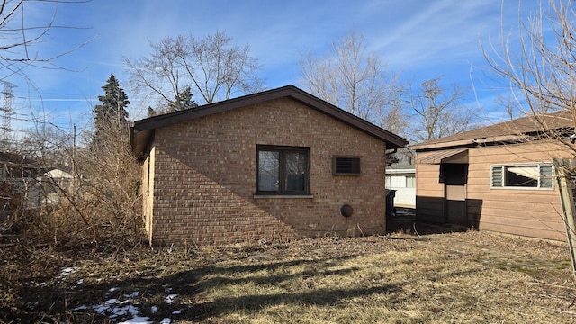 rear view of house with a lawn