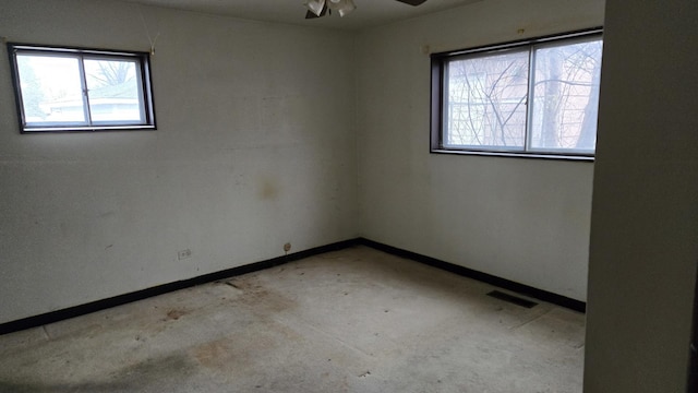 spare room featuring ceiling fan