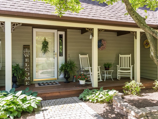 37W751 Orchard Ln, Elgin, IL 60124 - doorway to property featuring a porch and a shingled roof