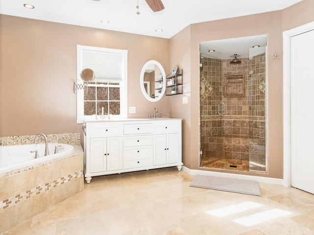 37W751 Orchard Ln, Elgin, IL 60124 - bathroom with double vanity, a ceiling fan, a garden tub, a shower stall, and a sink