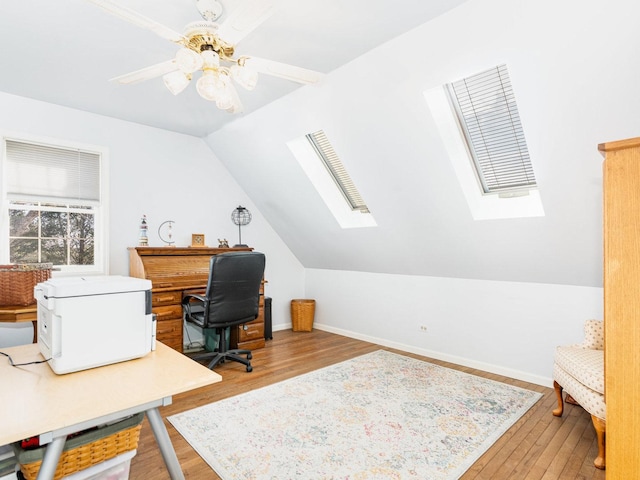 37W751 Orchard Ln, Elgin, IL 60124 - office with lofted ceiling with skylight, wood finished floors, a ceiling fan, and baseboards