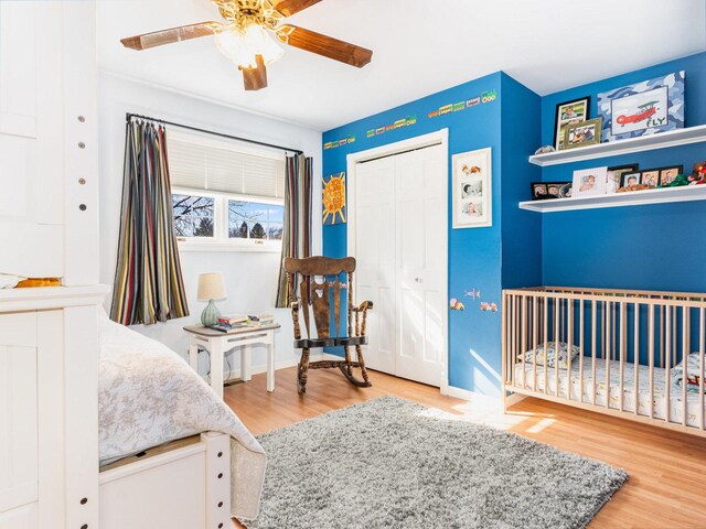 37W751 Orchard Ln, Elgin, IL 60124 - bedroom with wood finished floors, a closet, a ceiling fan, and a nursery area