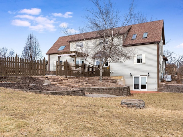 37W751 Orchard Ln, Elgin, IL 60124 - rear view of house featuring a shingled roof, fence, and a yard