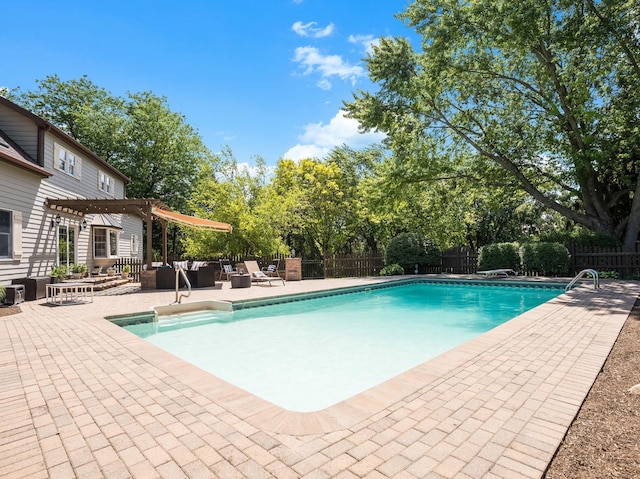 37W751 Orchard Ln, Elgin, IL 60124 - view of swimming pool with a pergola, a patio, a fenced backyard, and view of wooded area