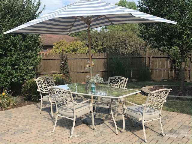37W751 Orchard Ln, Elgin, IL 60124 - view of patio / terrace featuring fence and outdoor dining area