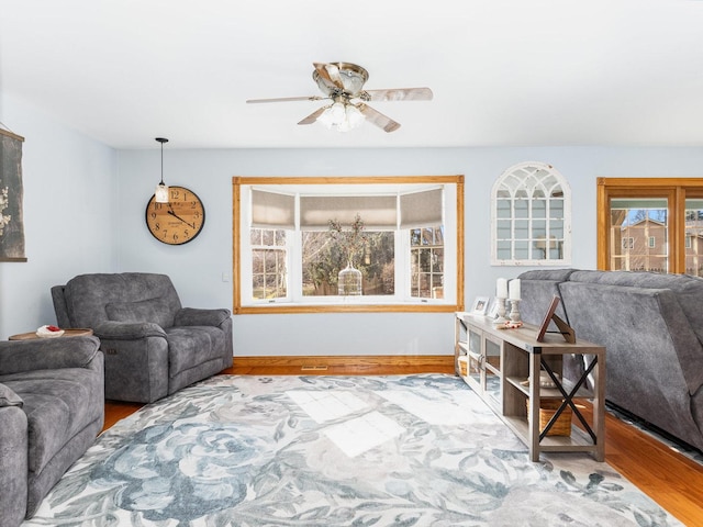 37W751 Orchard Ln, Elgin, IL 60124 - living area with healthy amount of natural light, ceiling fan, and wood finished floors