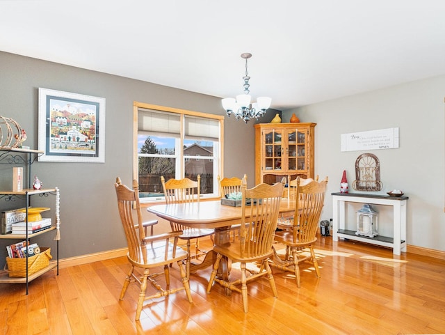 37W751 Orchard Ln, Elgin, IL 60124 - dining room with a chandelier and light wood finished floors