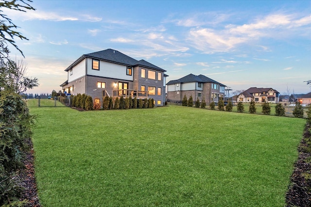 view of yard at dusk