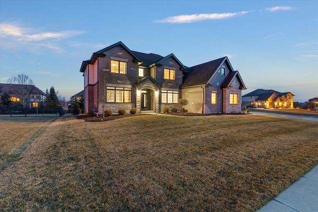 view of front of property with a lawn