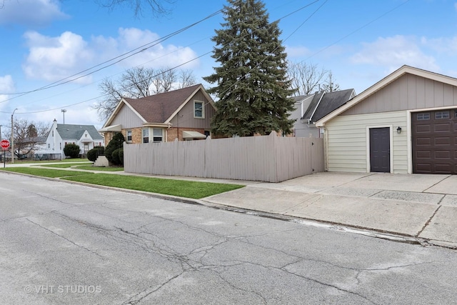 exterior space featuring a yard and a garage