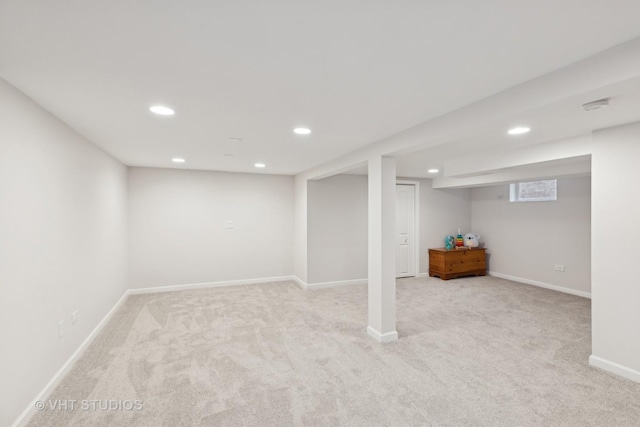 basement with light colored carpet