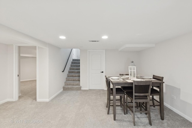 view of carpeted dining space