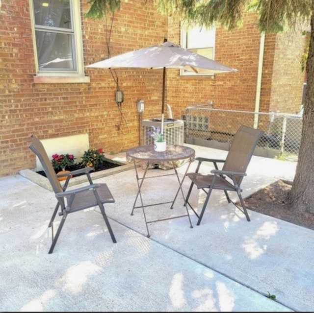 view of patio with central AC unit