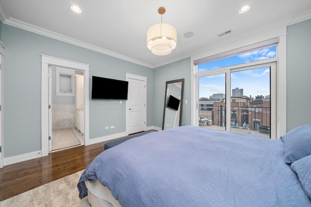 bedroom featuring crown molding, dark hardwood / wood-style floors, ensuite bathroom, and access to exterior