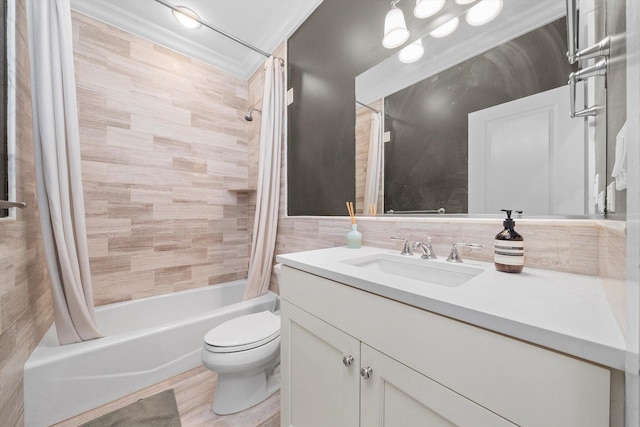 full bathroom featuring toilet, crown molding, vanity, shower / bath combo with shower curtain, and hardwood / wood-style floors