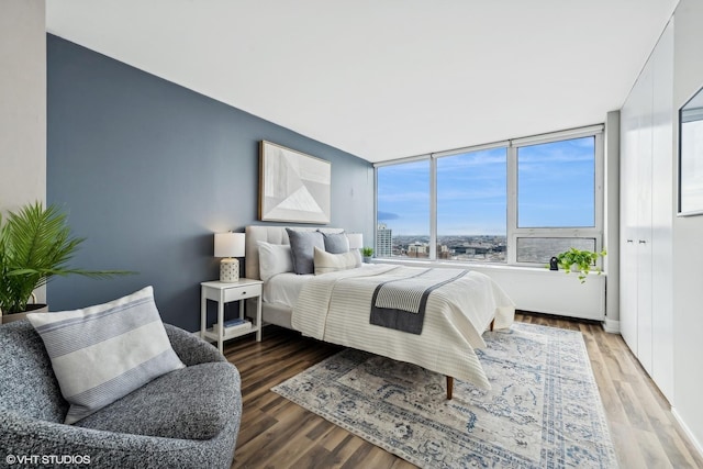 bedroom featuring hardwood / wood-style flooring