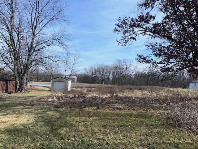 view of yard featuring a garage