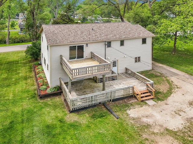 4204 E Dr, Wonder Lake, IL 60097 - back of property featuring a wooden deck, a yard, roof with shingles, and view of scattered trees