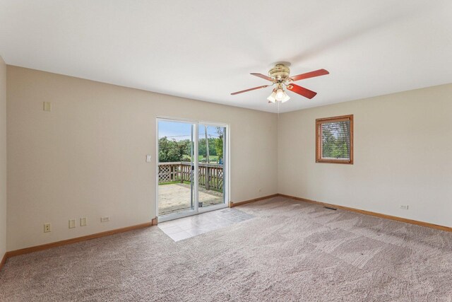 4204 E Dr, Wonder Lake, IL 60097 - empty room with a ceiling fan and light colored carpet