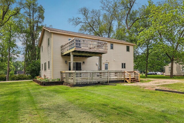 4204 E Dr, Wonder Lake, IL 60097 - back of property with a balcony, a yard, and a wooden deck