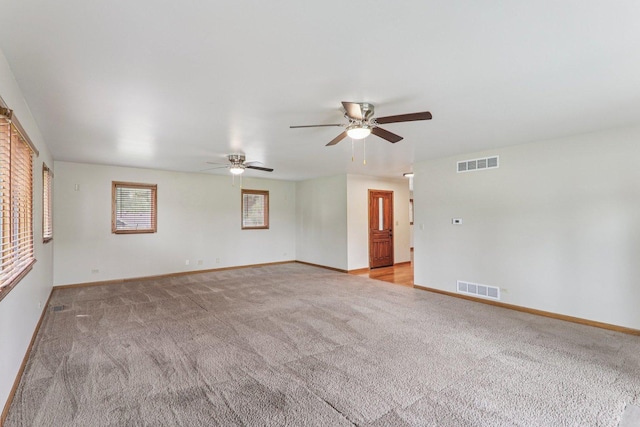 4204 E Dr, Wonder Lake, IL 60097 - unfurnished room featuring light colored carpet and ceiling fan