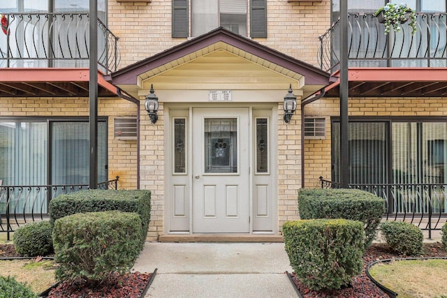 doorway to property with a balcony