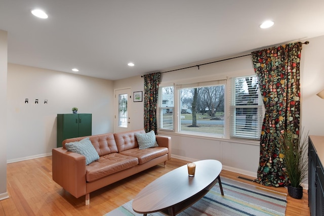 living room with light hardwood / wood-style floors