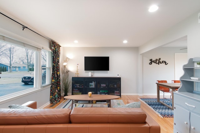 living room with light hardwood / wood-style floors