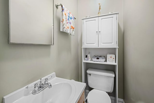 bathroom featuring sink and toilet