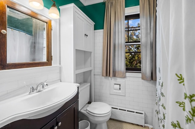 bathroom featuring walk in shower, toilet, tile walls, vanity, and a baseboard heating unit