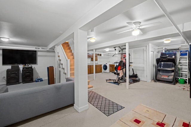 exercise room featuring carpet floors, independent washer and dryer, and ceiling fan